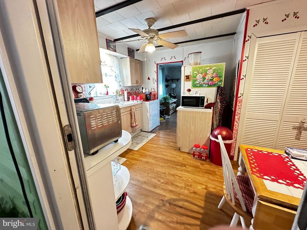 44 Midway Lane Bellmawr, NJ 08031 - Photo 13 of 17 a view of living room with furniture and a flat screen tv