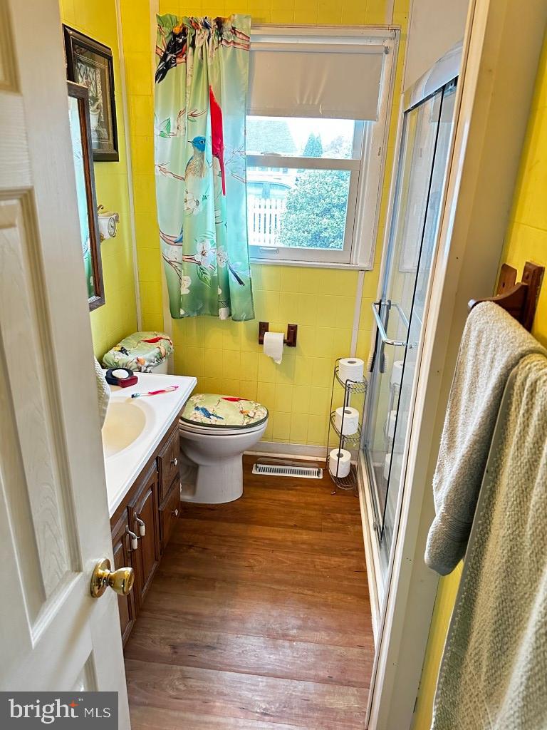 44 Midway Lane Bellmawr, NJ 08031 - Photo 17 of 17 a bathroom with a sink mirror vanity and toilet
