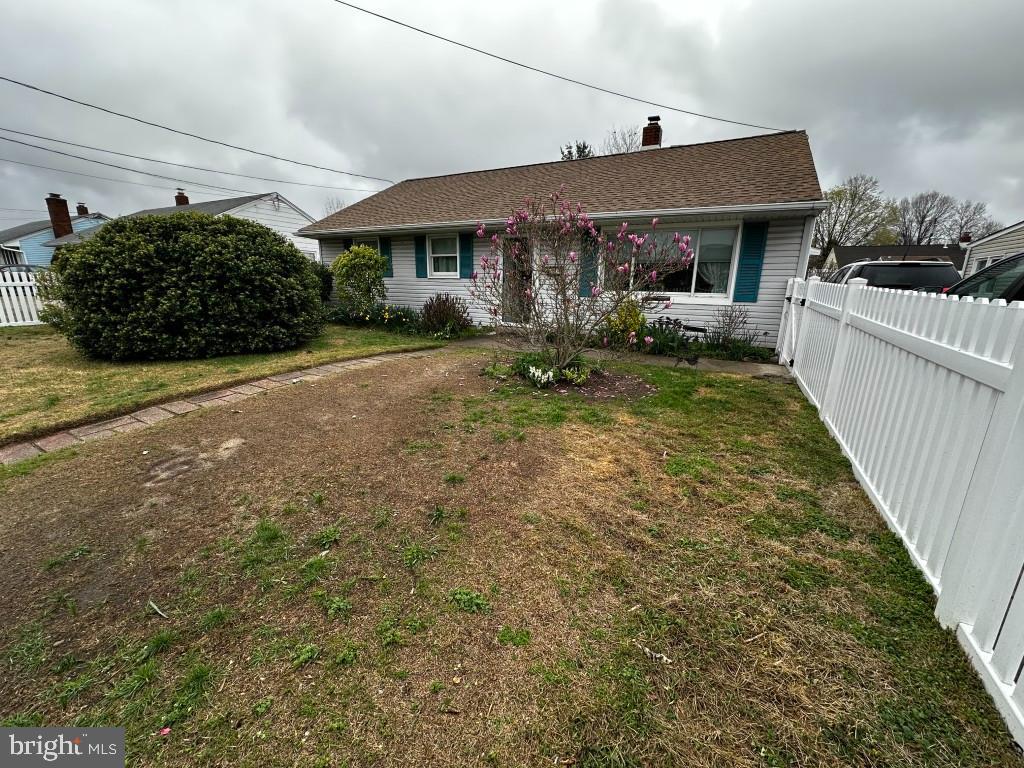 44 Midway Lane Bellmawr, NJ 08031 - Photo 2 of 17 a front view of a house with garden
