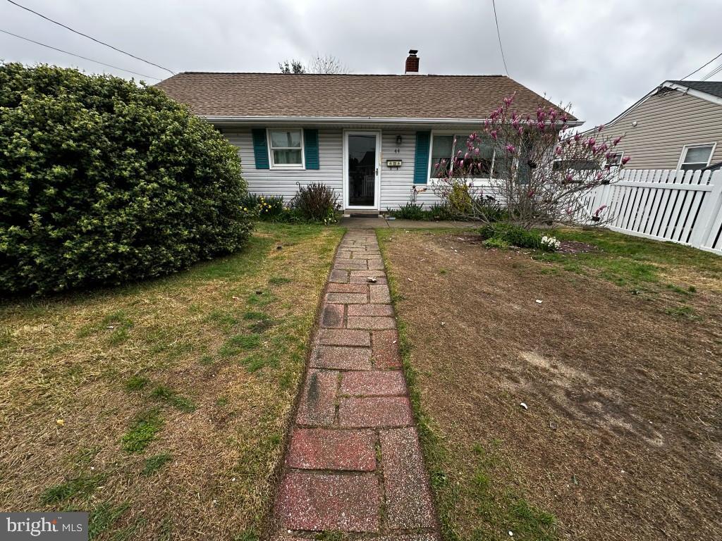 44 Midway Lane Bellmawr, NJ 08031 - Photo 3 of 17 a front view of a house with garden