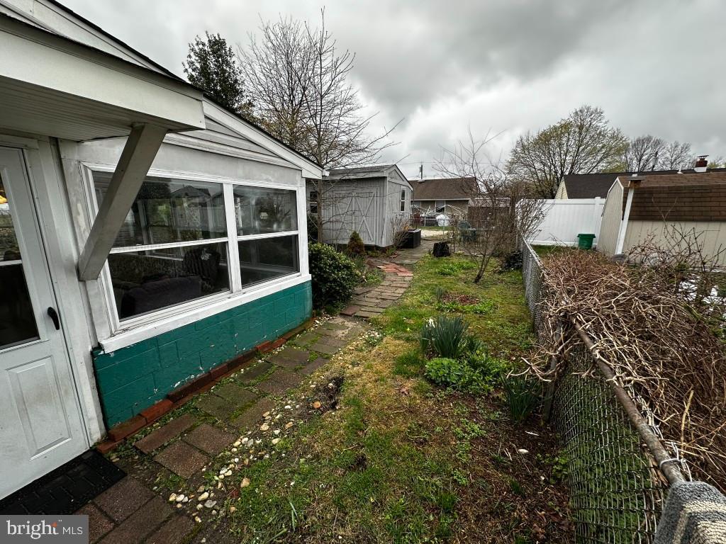 44 Midway Lane Bellmawr, NJ 08031 - Photo 8 of 17 a view of a house with a yard
