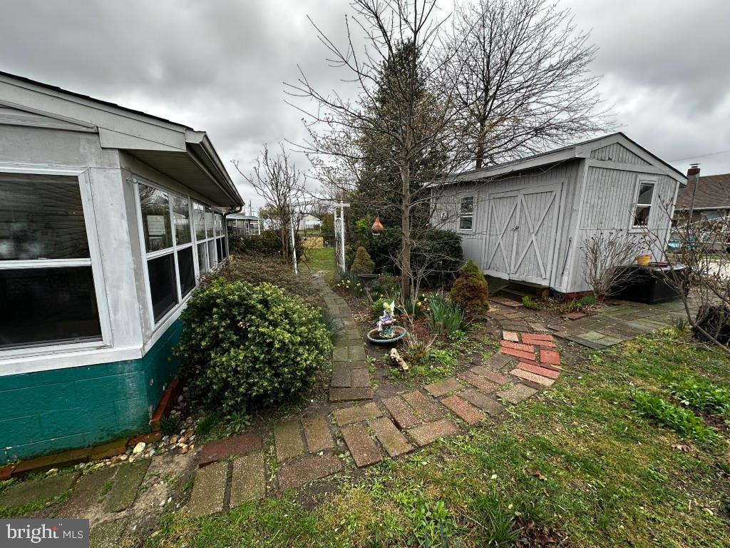 44 Midway Lane Bellmawr, NJ 08031 - Photo 9 of 17 a backyard of a house with yard and outdoor seating