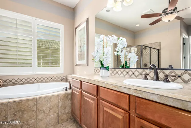 a bathroom with a bathtub and a shower