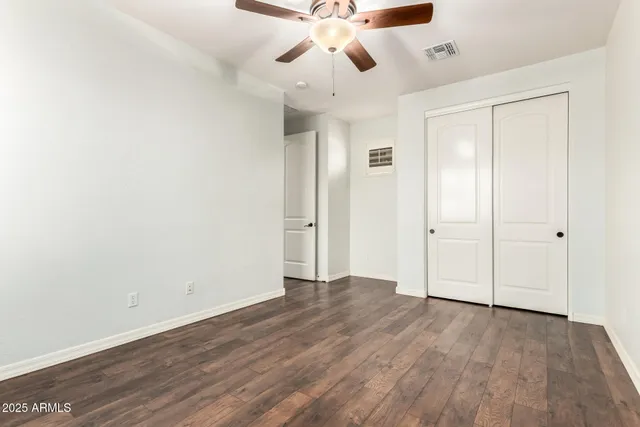 a bathroom with a double vanity sink a vanity and a mirror