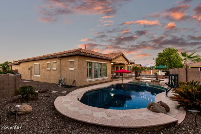 a view of a house with swimming pool