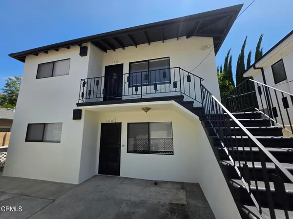 a front view of a house with entryway