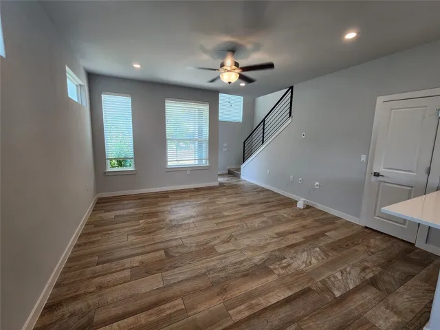 a view of a kitchen with a sink and a window