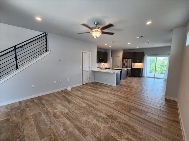 a view of a kitchen with a sink and cabinet area