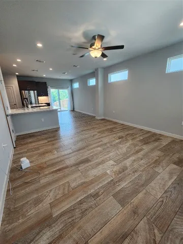 a kitchen with stainless steel appliances granite countertop a stove a sink and a oven
