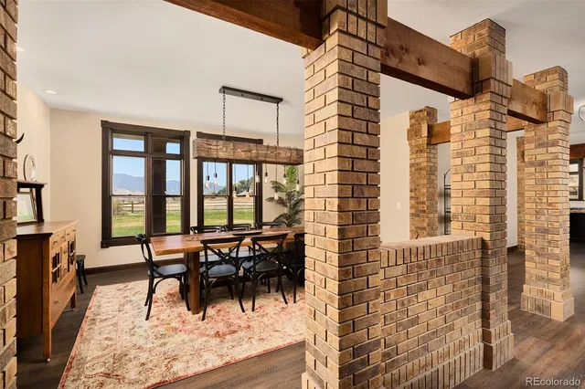 a view of front door with wooden floor
