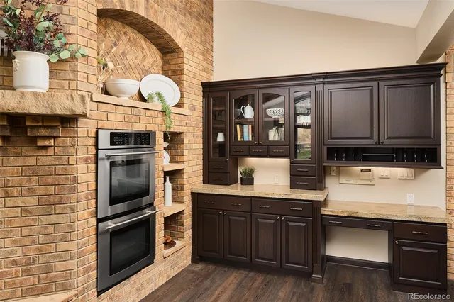 a kitchen with a table and a stove