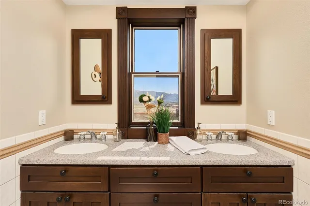 a backyard with a table and chair