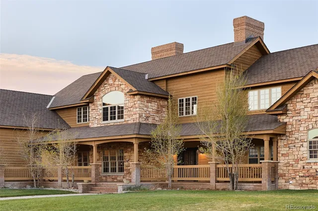 front view of a house with a swimming pool