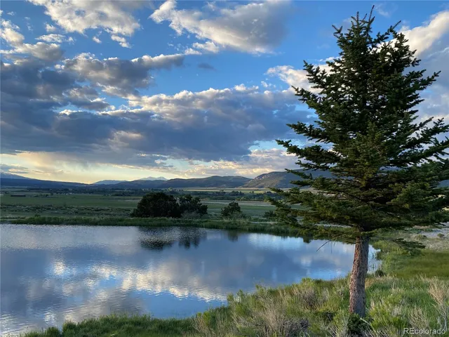 a view of a lake with a mountain in the background