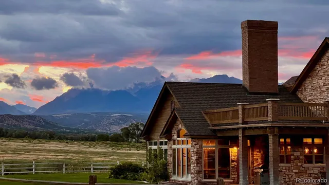 a front view of a house with a ocean view