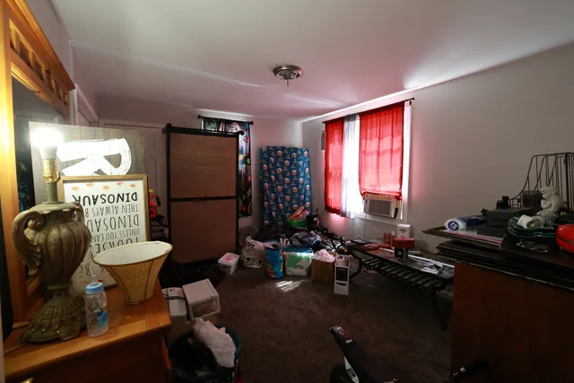 a room with furniture and a window