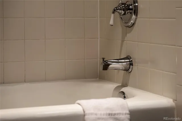 a view of a swimming pool with a deck