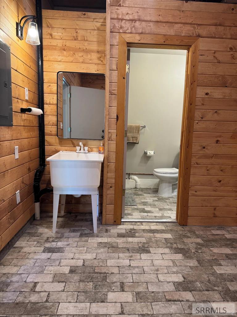 3776 Snake River Road Island Park, ID 83429 - Photo 34 of 74 Washrub Sauna Room/Garage entrace