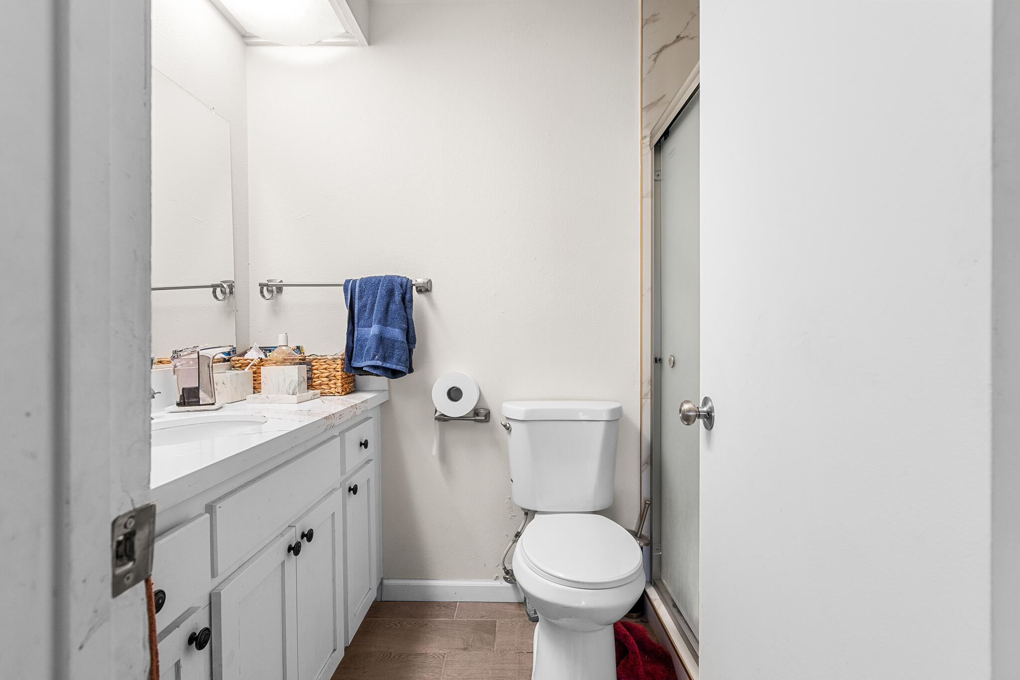 45546 Aladdin Street, Unit A101 Indio, CA 92201 - Photo 19 of 22 a bathroom with a sink and a toilet