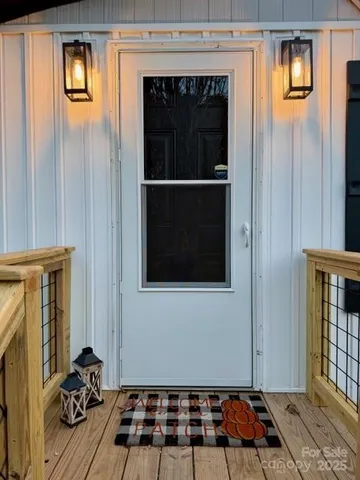 a view of a livingroom with furniture and a window