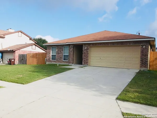 a front view of house with yard