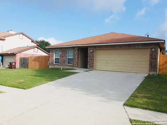 a front view of house with yard
