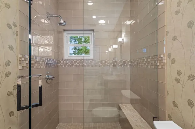 a bathroom with a sink and a washer