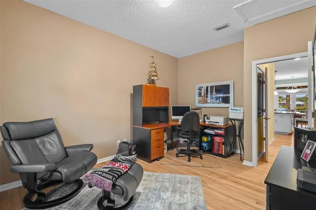 a kitchen with granite countertop a sink and a window