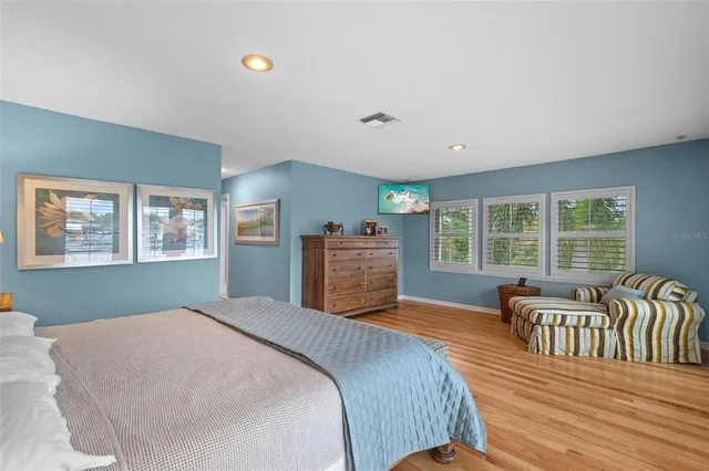a view of a balcony with chairs