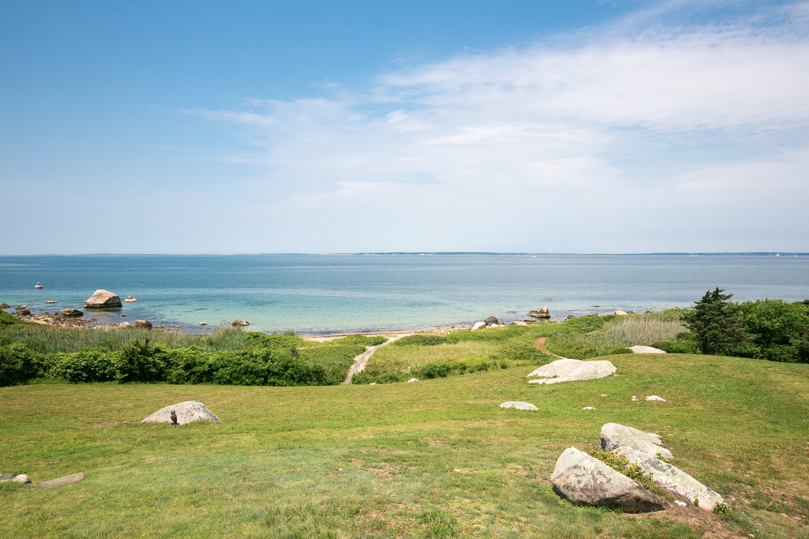 35 Harlock Pond Road Chilmark, MA 02535 - Photo 9 of 37 Gently sloping lawn to boardwalk to beach.