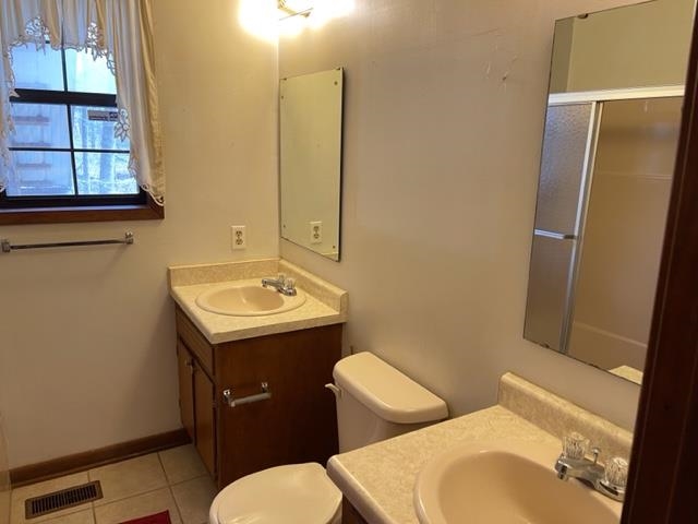 620 Harris Road Bolivar, TN 38008 - Photo 11 of 24 a bathroom with a sink and a mirror