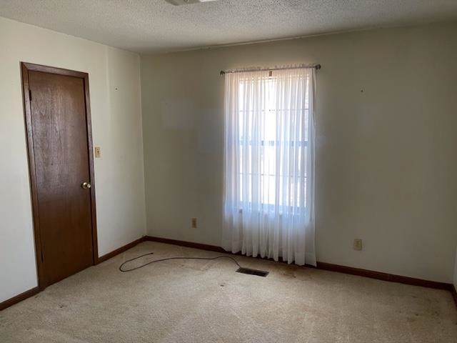 620 Harris Road Bolivar, TN 38008 - Photo 13 of 24 an empty room with windows