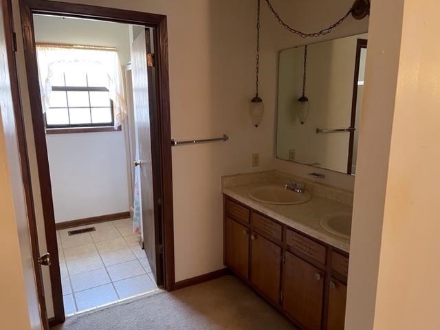 620 Harris Road Bolivar, TN 38008 - Photo 15 of 24 a bathroom with a shower sink and mirror