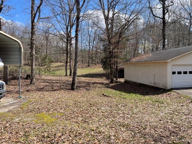 620 Harris Road Bolivar, TN 38008 - Photo 4 of 24 a view of a back yard of the house