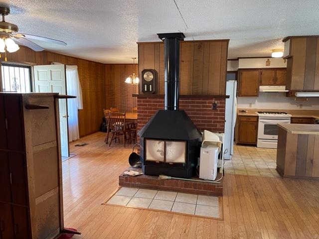 620 Harris Road Bolivar, TN 38008 - Photo 7 of 24 a kitchen with kitchen island a counter top space a sink stainless steel appliances and cabinets