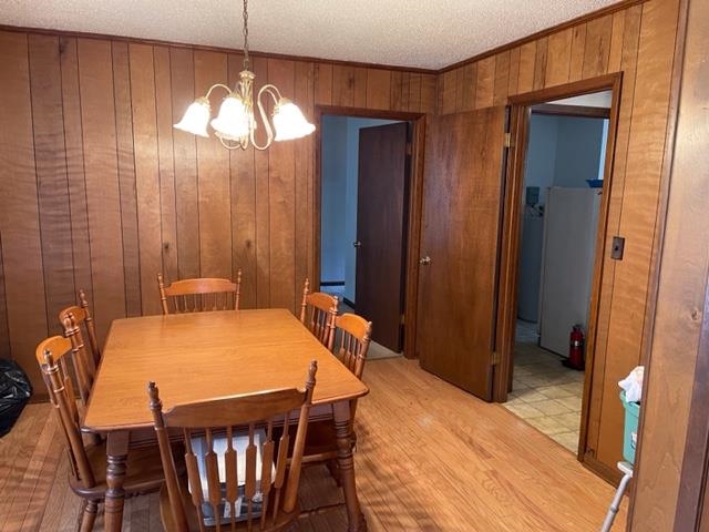 620 Harris Road Bolivar, TN 38008 - Photo 8 of 24 a bed room with a bed and a chandelier