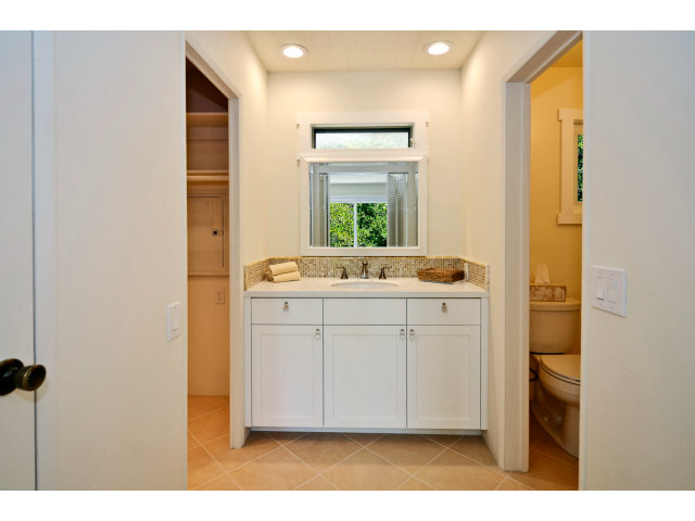 552 Bean Creek Road, Unit 88 Scotts Valley, CA 95066 - Photo 17 of 25 a bathroom with a sink a mirror and a window