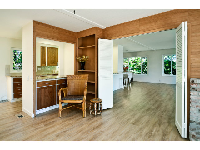 552 Bean Creek Road, Unit 88 Scotts Valley, CA 95066 - Photo 10 of 25 a view of a livingroom with furniture wooden floor and a kitchen
