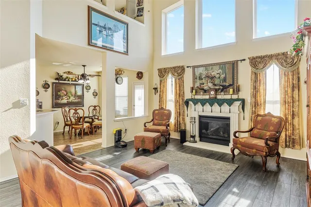 a bedroom with furniture and a fireplace