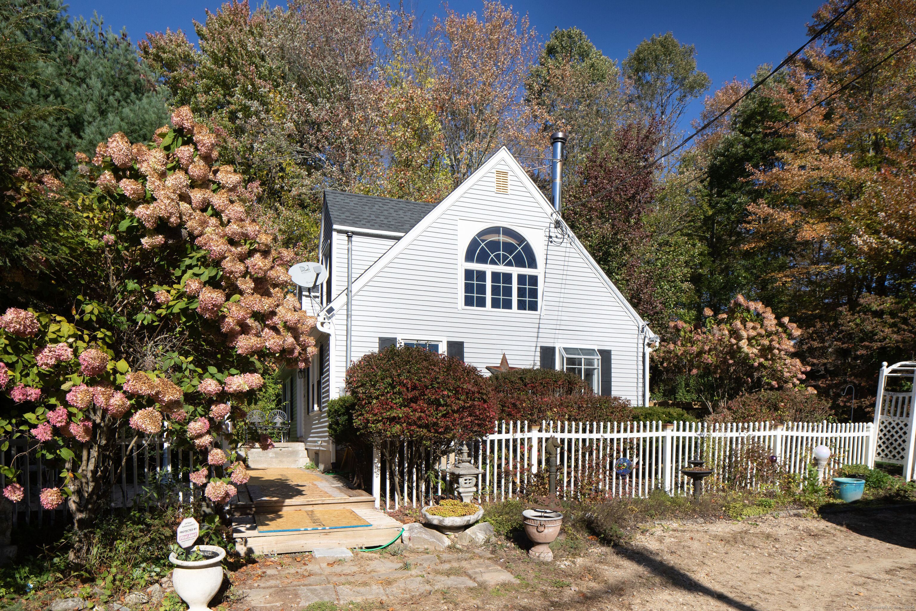 101I Sand Road North Canaan, CT 06018 - Photo 1 of 1 a view of house with a yard and sitting area