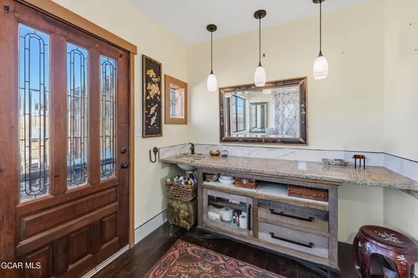 a kitchen with a stove and a sink