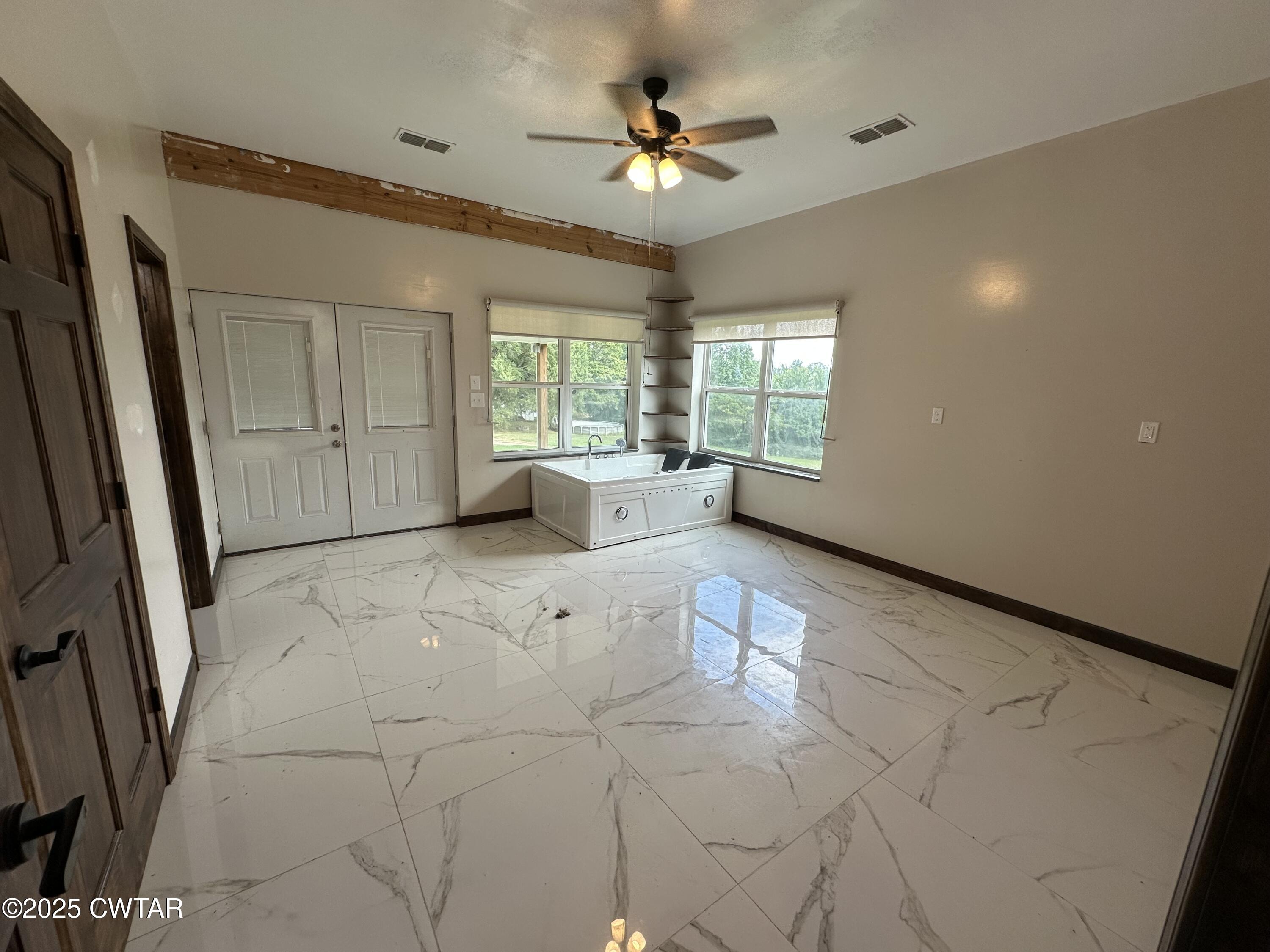 273 Fletcher Road Dyer, TN 38330 - Photo 13 of 46 a view of n empty room with a window