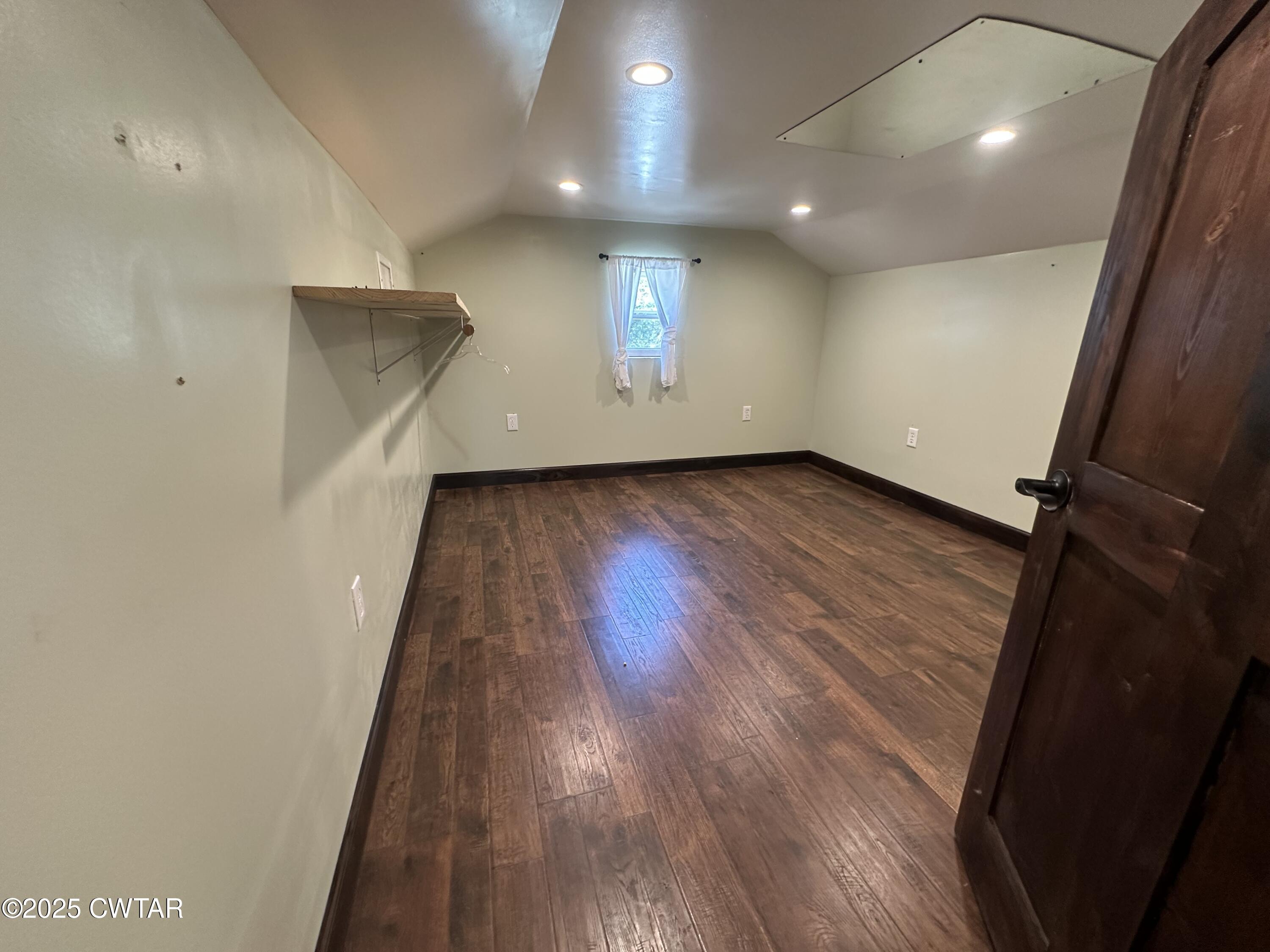 273 Fletcher Road Dyer, TN 38330 - Photo 20 of 46 an empty room with wooden floor and windows