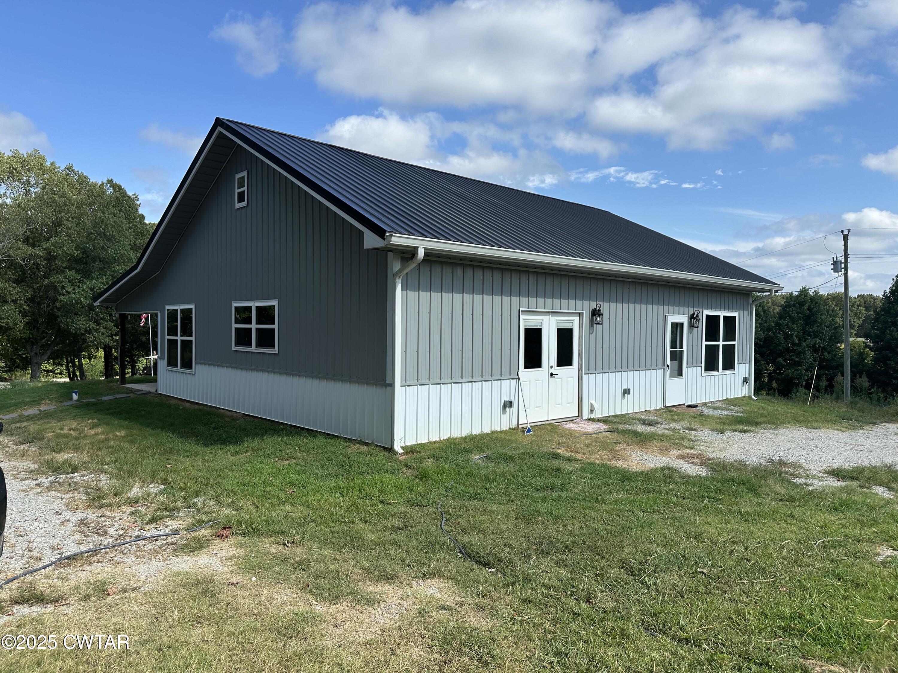 273 Fletcher Road Dyer, TN 38330 - Photo 28 of 46 a front view of house with yard and green space