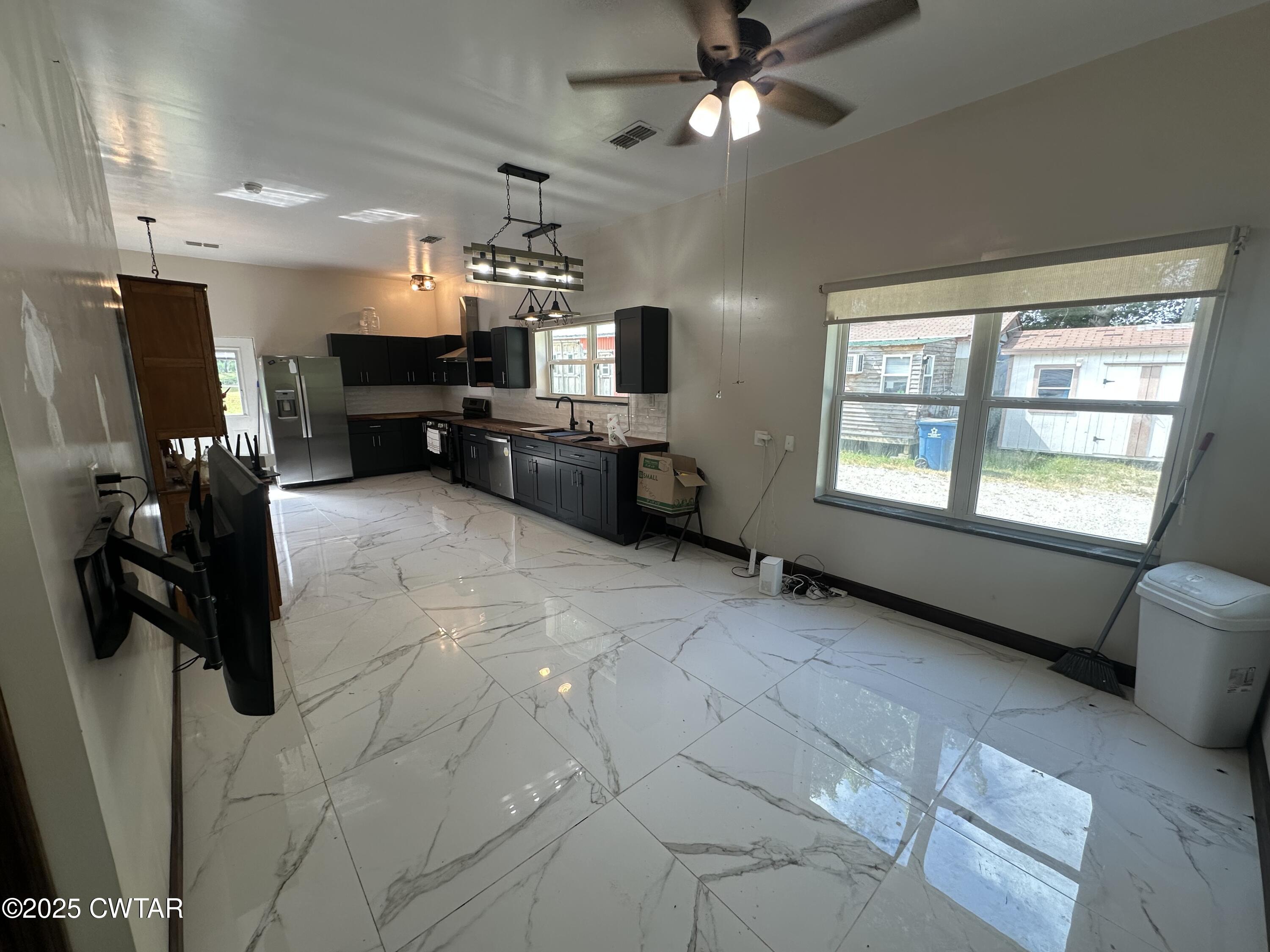 273 Fletcher Road Dyer, TN 38330 - Photo 3 of 46 a view of a livingroom with furniture and a window
