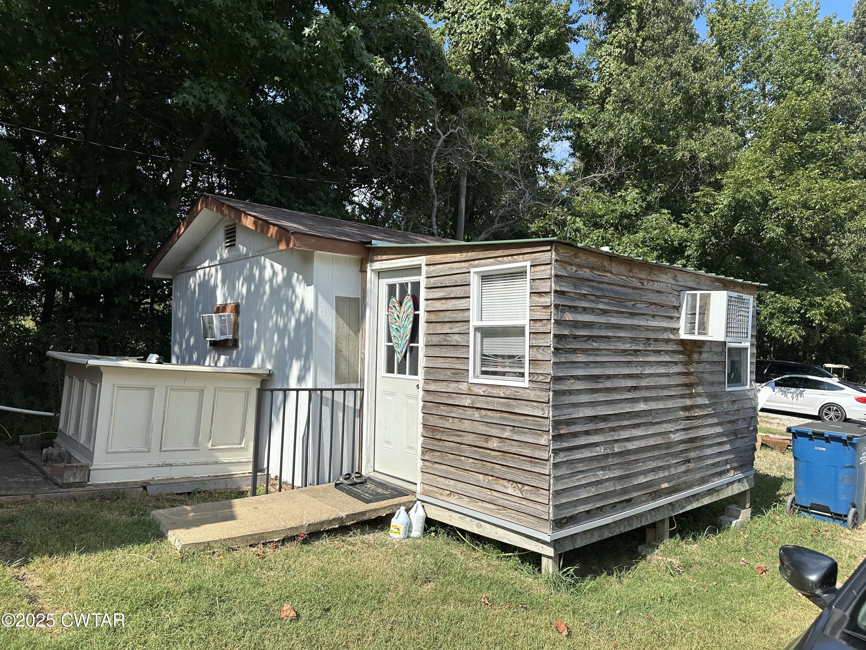 273 Fletcher Road Dyer, TN 38330 - Photo 31 of 46 a view of a house with a yard