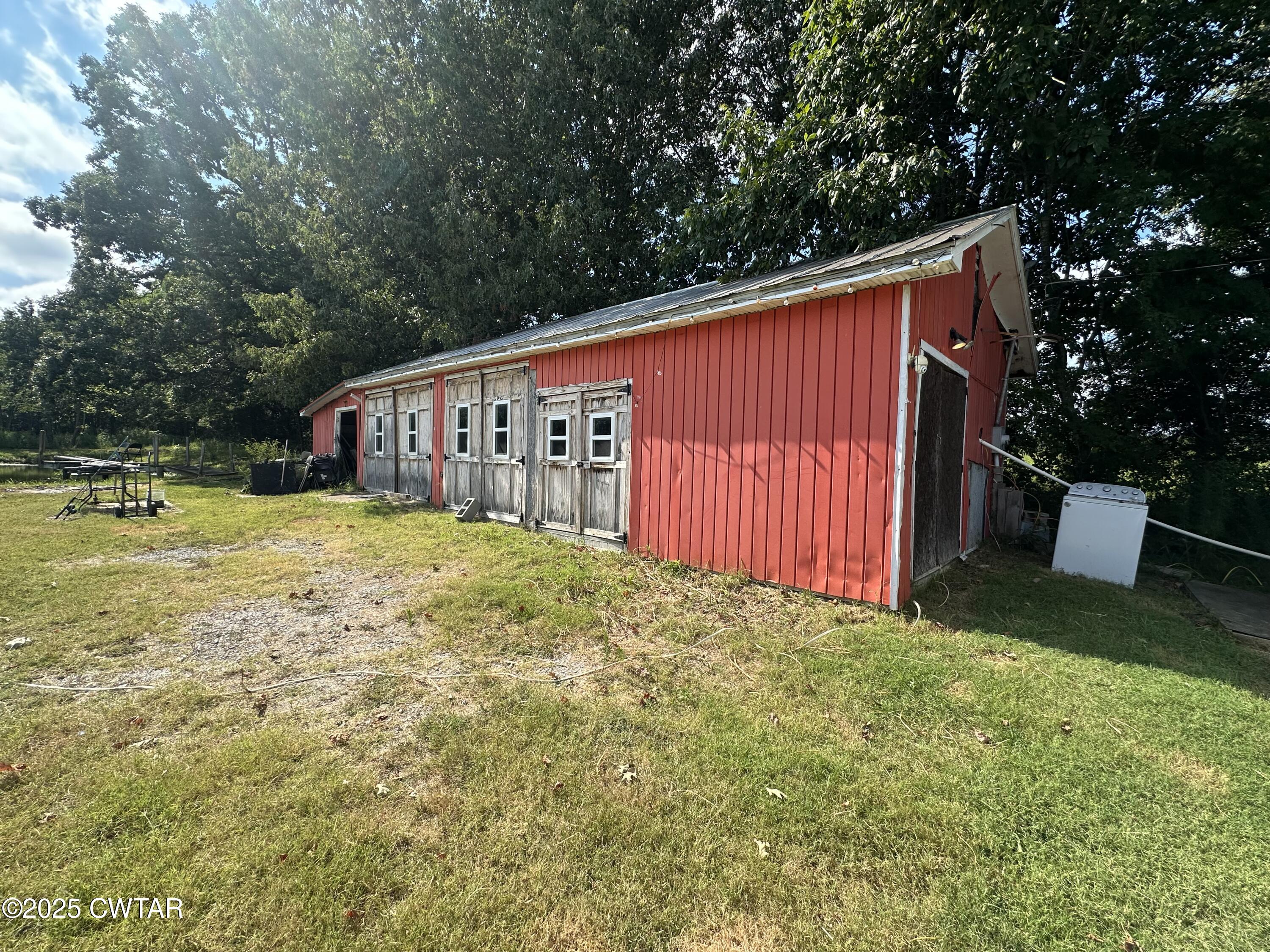 273 Fletcher Road Dyer, TN 38330 - Photo 36 of 46 a view of a house with backyard and sitting area