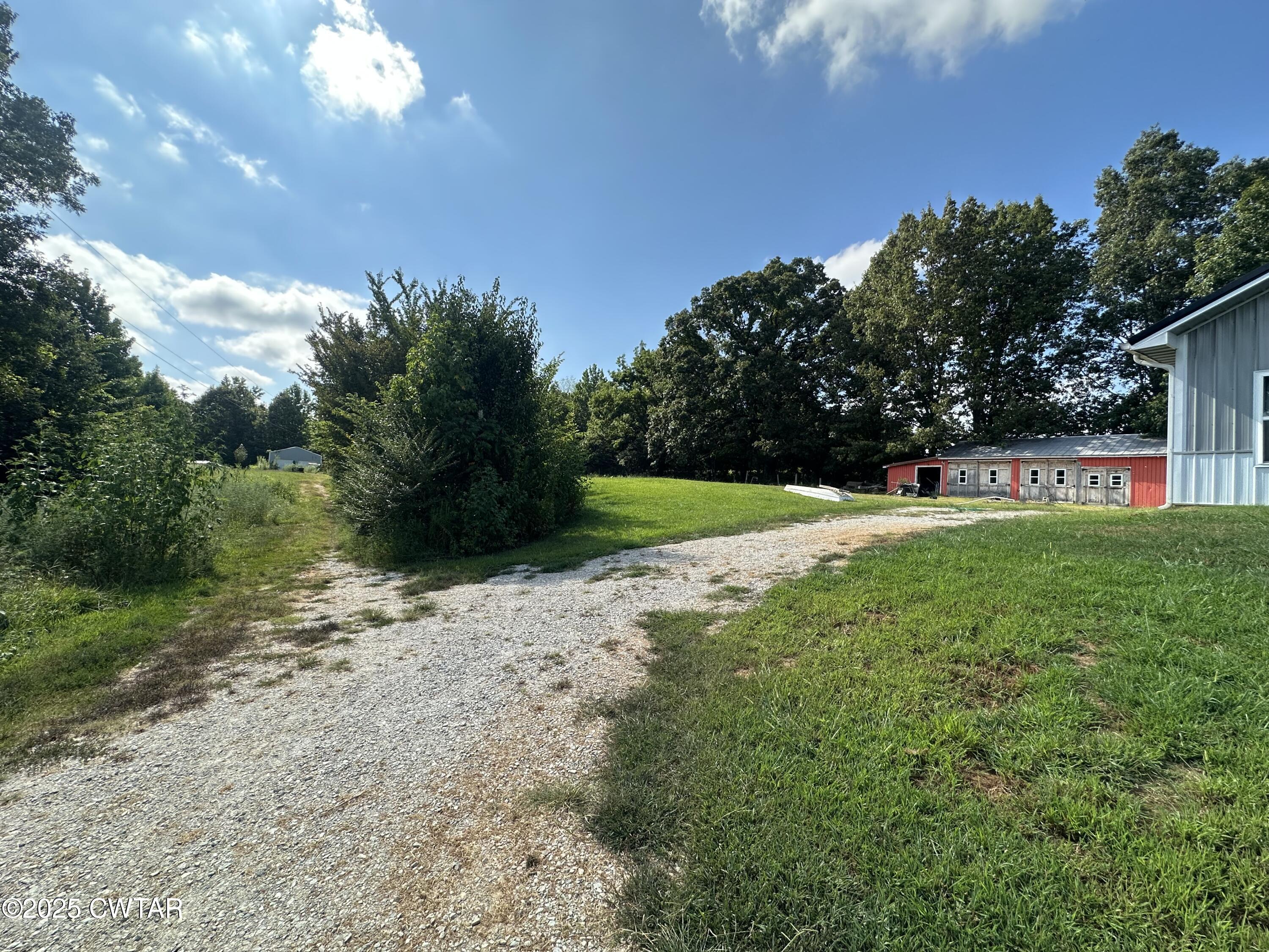 273 Fletcher Road Dyer, TN 38330 - Photo 42 of 46 a view of a house with a yard