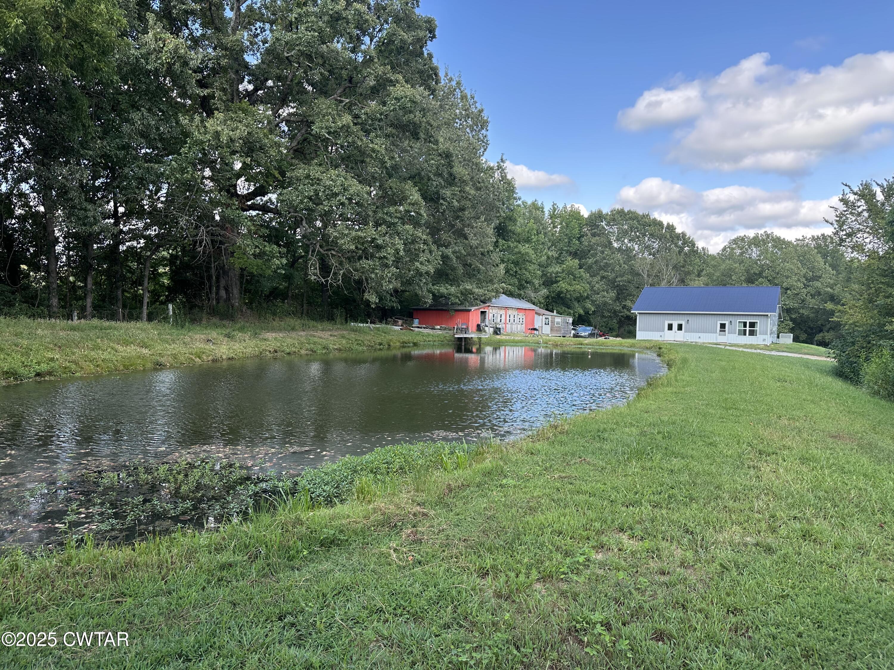 273 Fletcher Road Dyer, TN 38330 - Photo 45 of 46 a view of a lake with houses