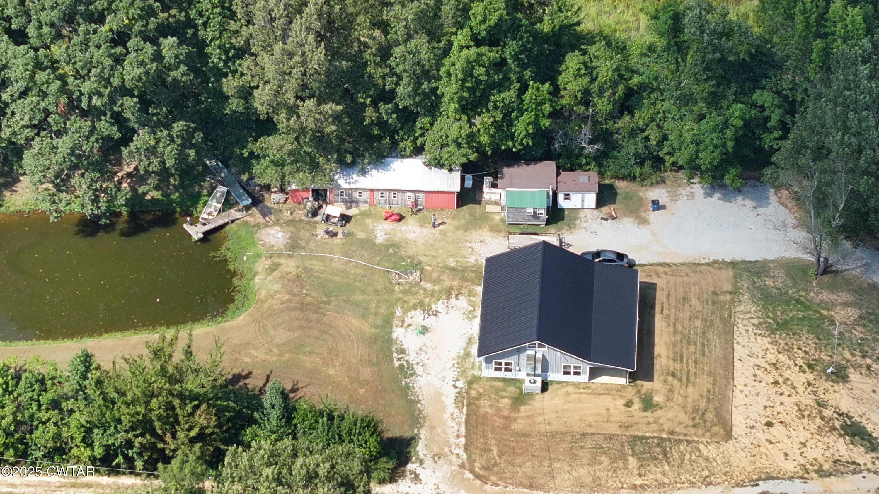 273 Fletcher Road Dyer, TN 38330 - Photo 46 of 46 an aerial view of a house with a yard basket ball court